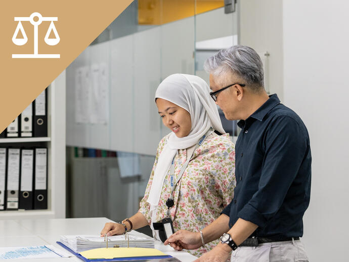 Employees working on documentation